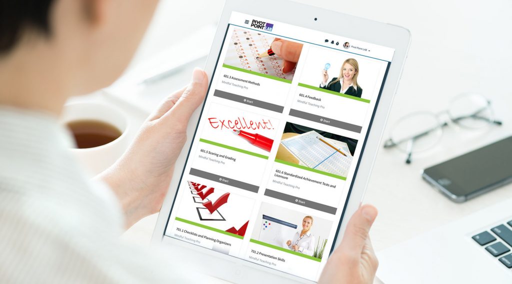 Kiev, Ukraine - June 27, 2014: Woman looking on Pinterest application boards on modern white Apple iPad Air, which is designed and developed by Apple inc. and was released on November 1, 2013.