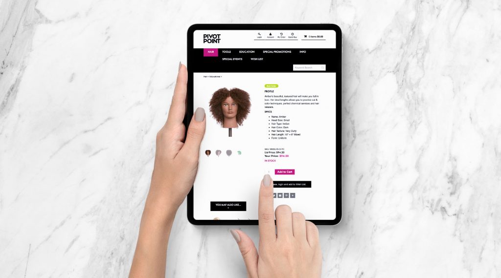 Woman checking Pivot Point Web Store with tablet
