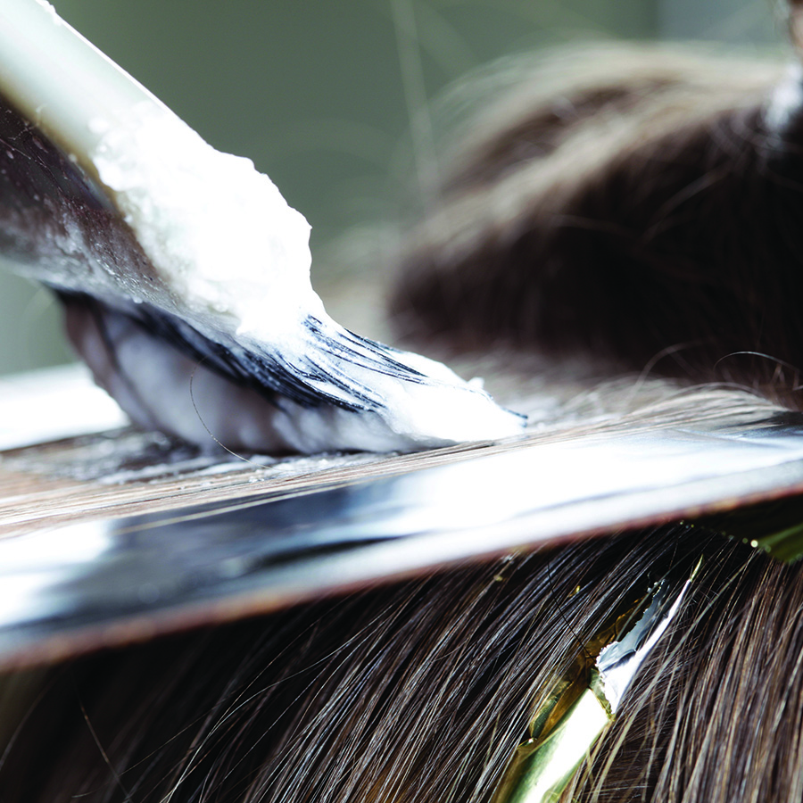 Close up of highlight application with bleach